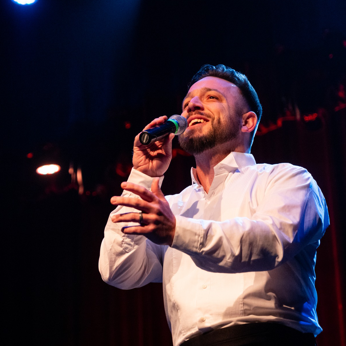 Photo of man singing